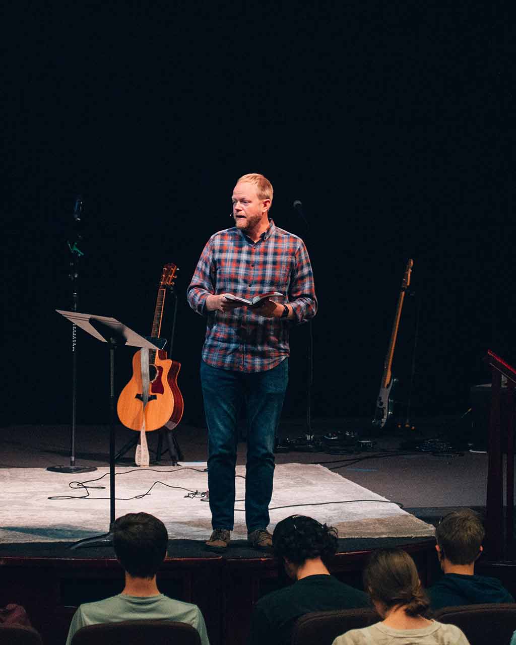 Drew Hill speaking at a conference